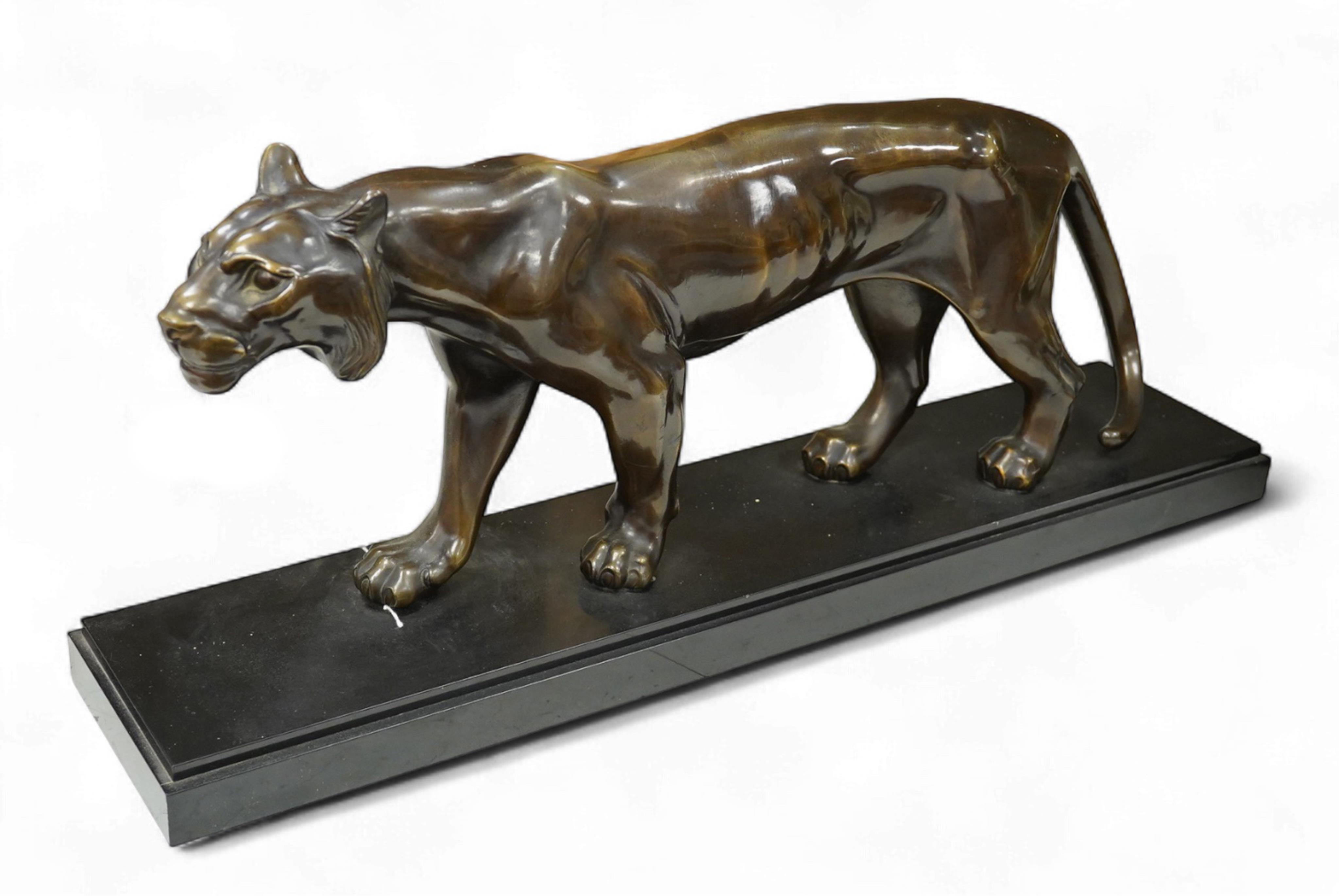 Manner of Maurice Font (19th/20th century): An Art Deco style bronzed spelter model of a tiger